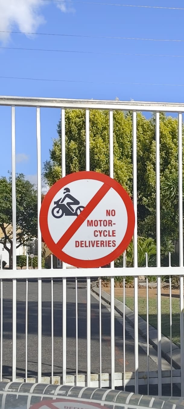 Estate notice showing that deliveries by motorbike are prohibited